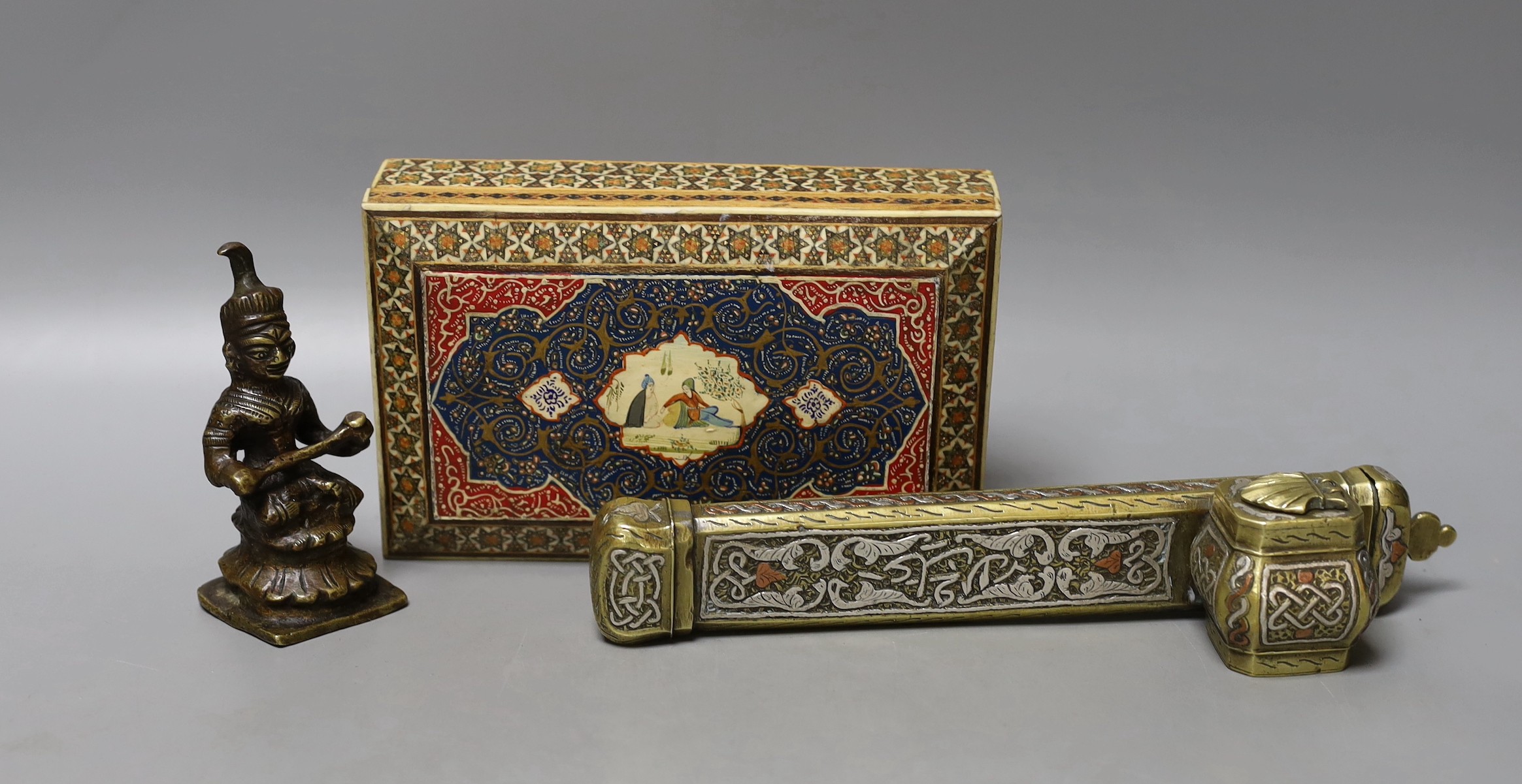 An Indo Persian group, scribes box, deity and cigarette box